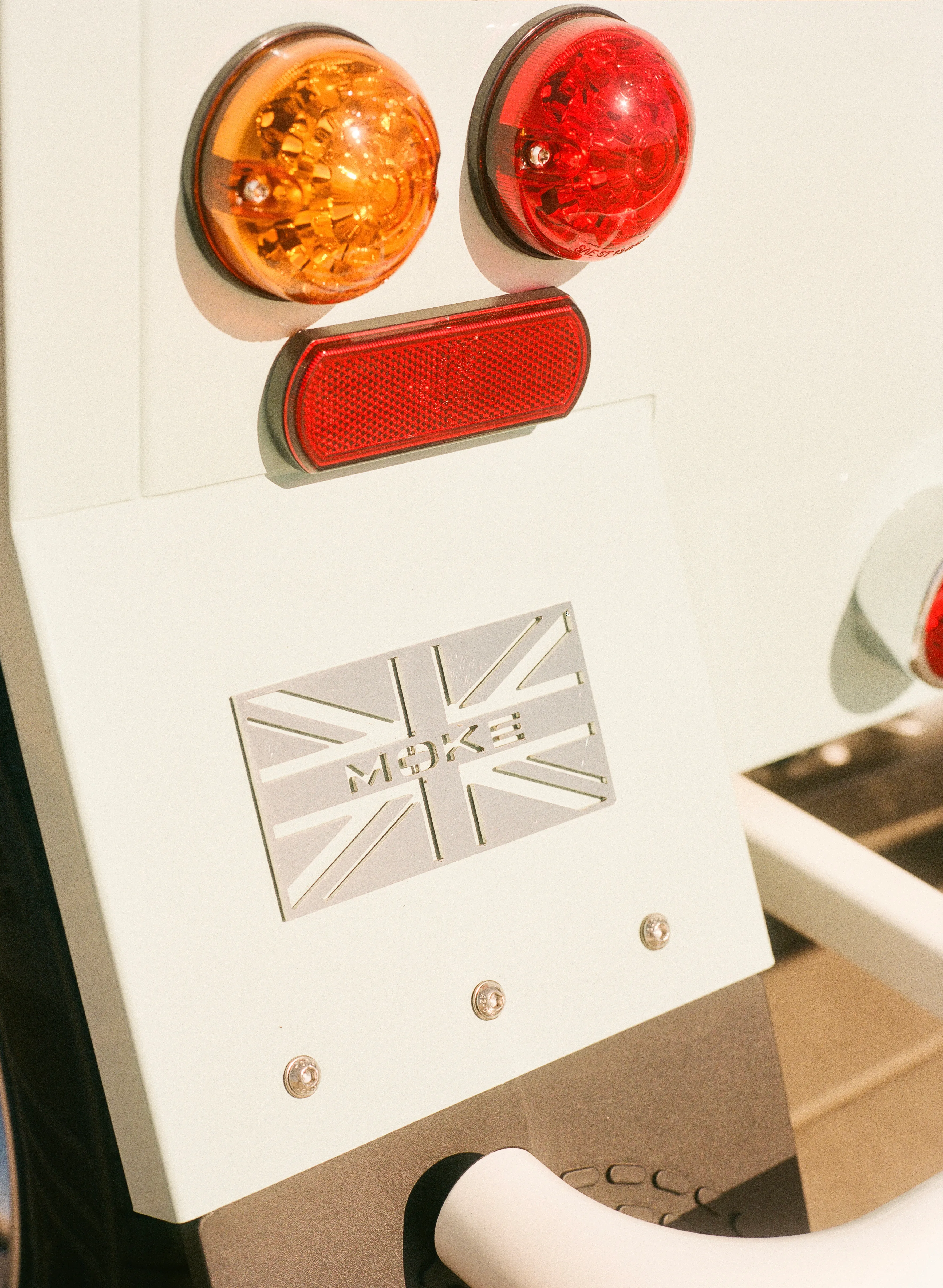 Moke taillight with Union Jack heritage badge