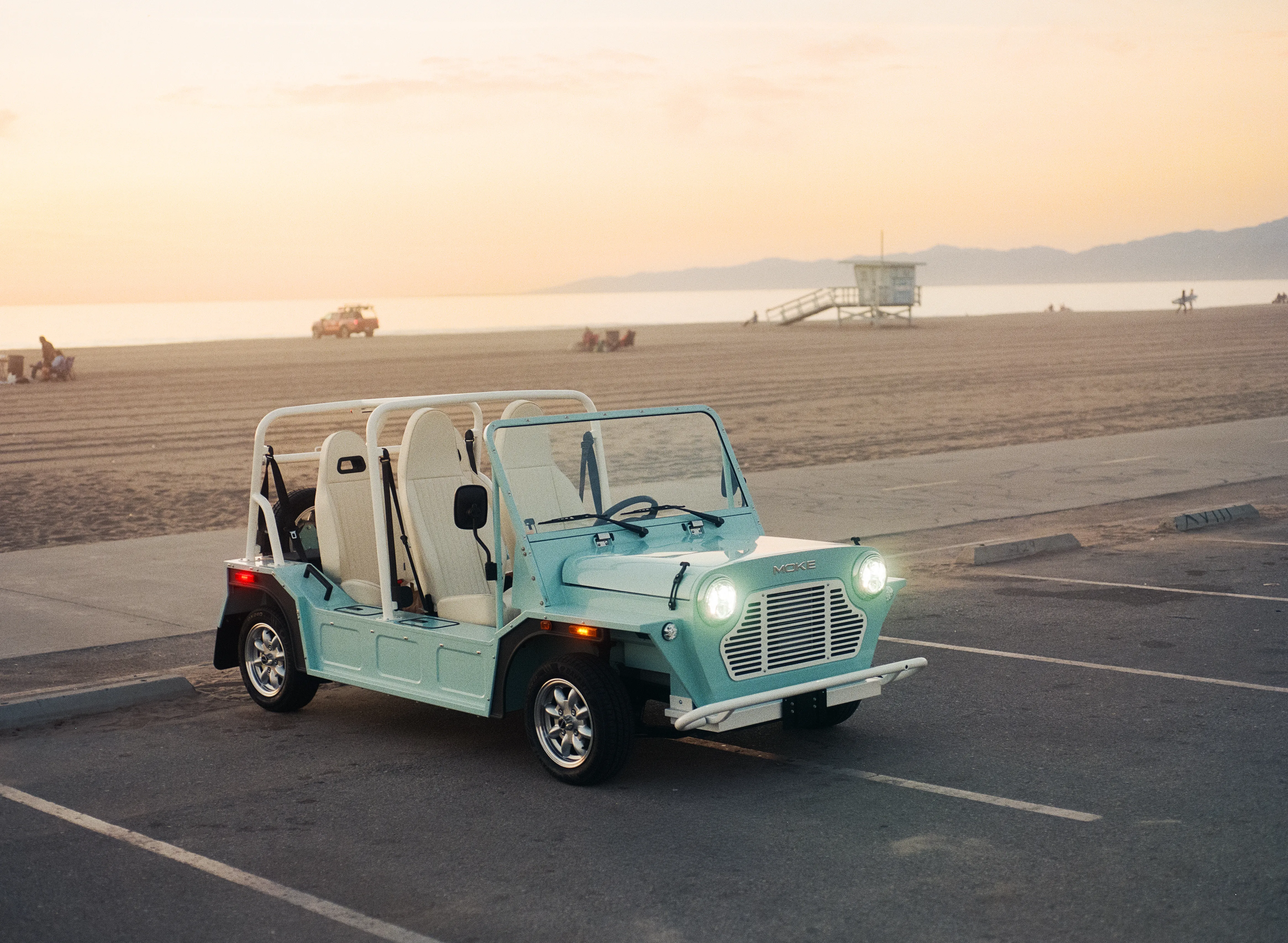 Fleet of Mokes lined up at a beachside property