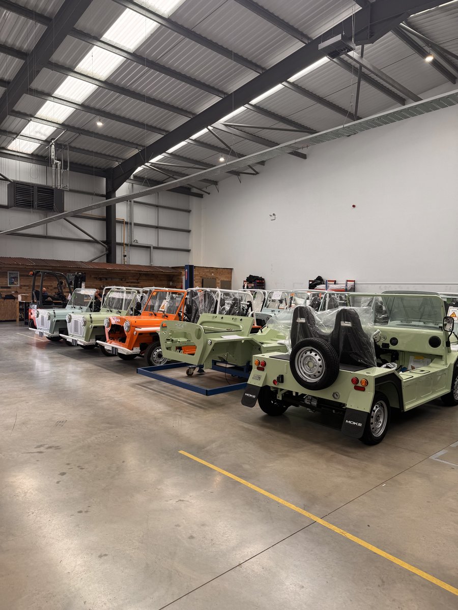 Multiple Mokes in production lineup showing color variations and individual assembly stages